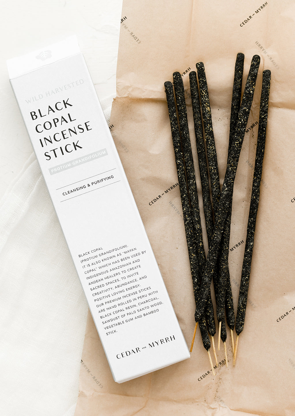 Black Copal: Black copal rolled incense sticks.