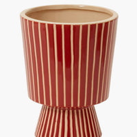 Large [$74.00]: A footed planter with vertical white stripes on red ceramic.