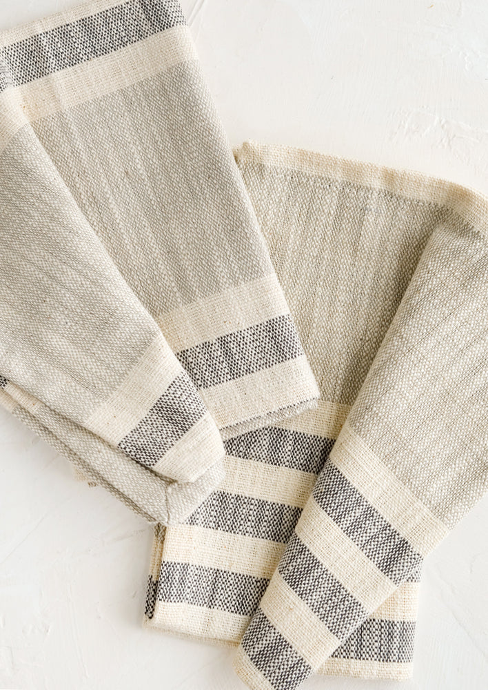 Chambray Stripe: A pair of folded napkins in chambray stripes.
