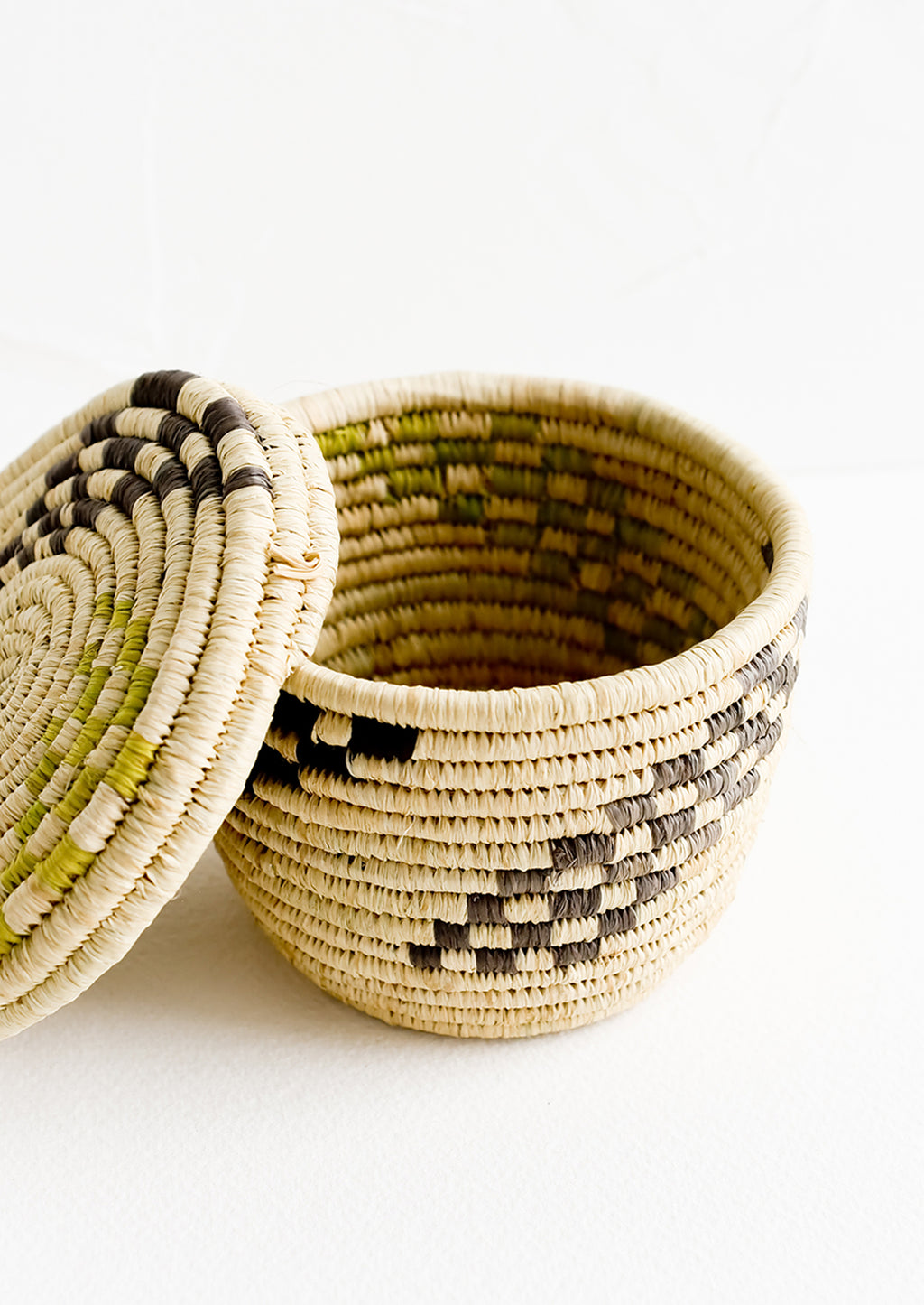 3: Small raffia baskets in woven checker print.