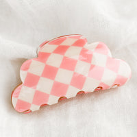 Pink / Cream: A cloud shaped hair claw in pink and white checker.