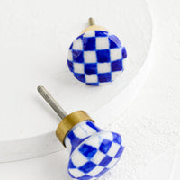 Blue Multi: Round ceramic cabinet knobs with blue and white checkered pattern