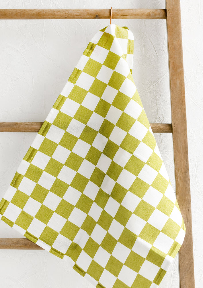 Lime: A checkered linen tea towel in green and white.