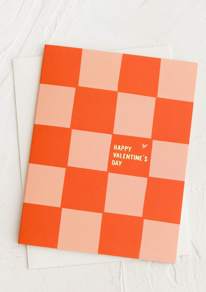 1: A red and pink checker print card reading "Happy Valentine's Day".