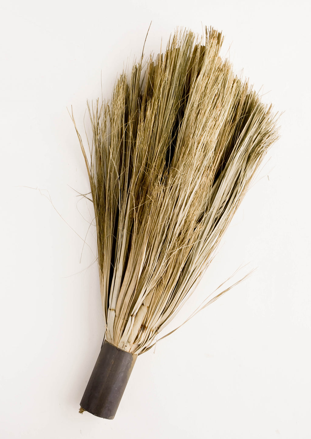 1: Primitive style handheld broom with cylindrical metal handle