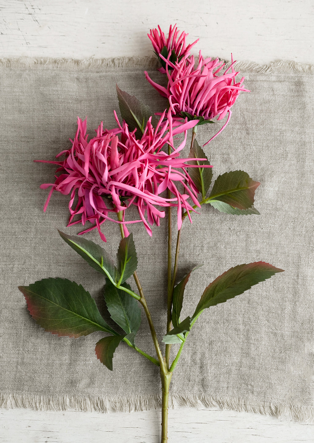 Berry Pink: A faux chrysanthemum stem with pink flowers.