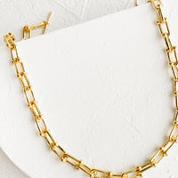 1: A chunky chainlink necklace in gold.