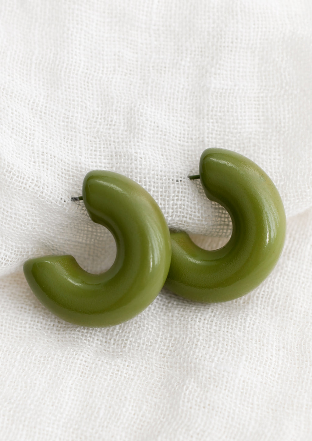 Martini: A pair of chunky gloss finish hoop earrings in martini olive.
