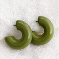 Martini: A pair of chunky gloss finish hoop earrings in martini olive.