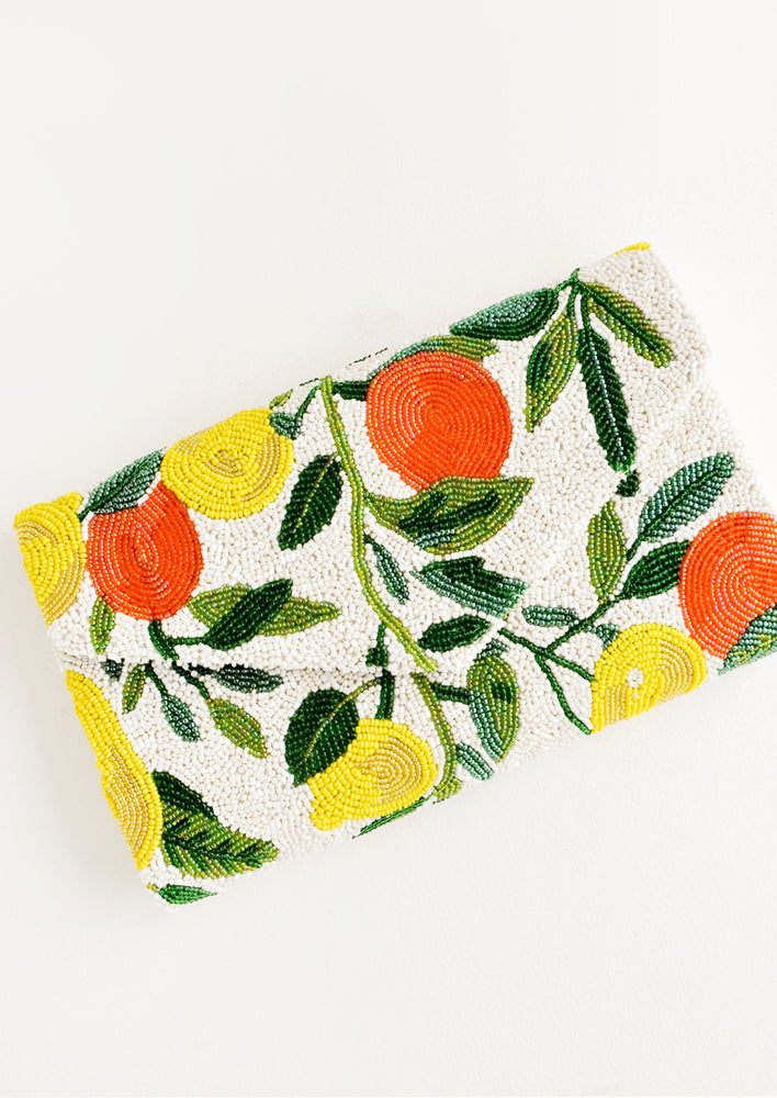 Envelope style clutch with flap front, allover beaded citrus print