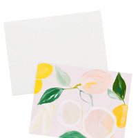 2: Greeting card with pastel scene of sliced and whole citrus fruits, with white envelope