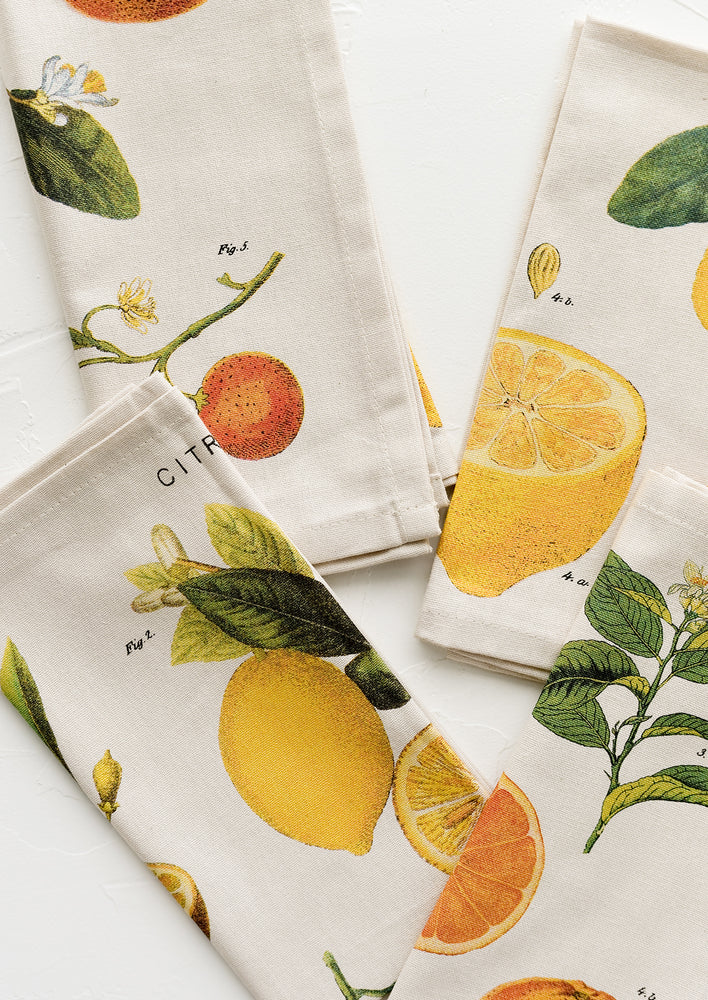 A set of four citrus printed cotton napkins.