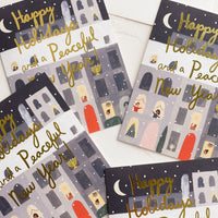 Boxed Set of 8: An illustrated greeting card set featuring apartment building with window scenes.