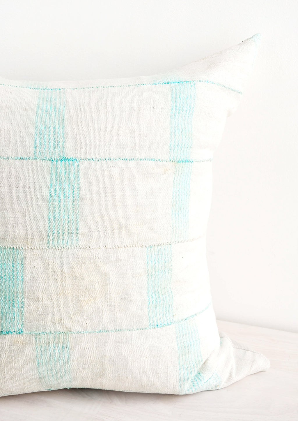 2: Square throw pillow in faded vintage fabric with vertical line print