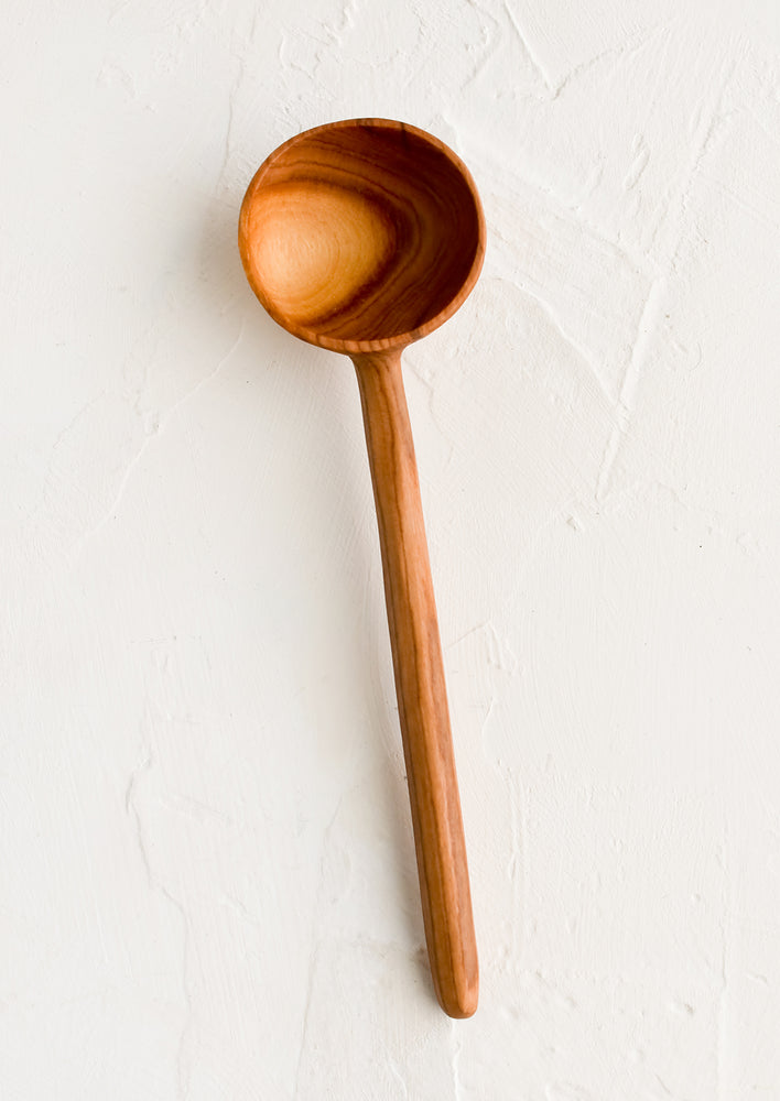 Plain Olivewood: A plain olivewood coffee scoop without any detailing.