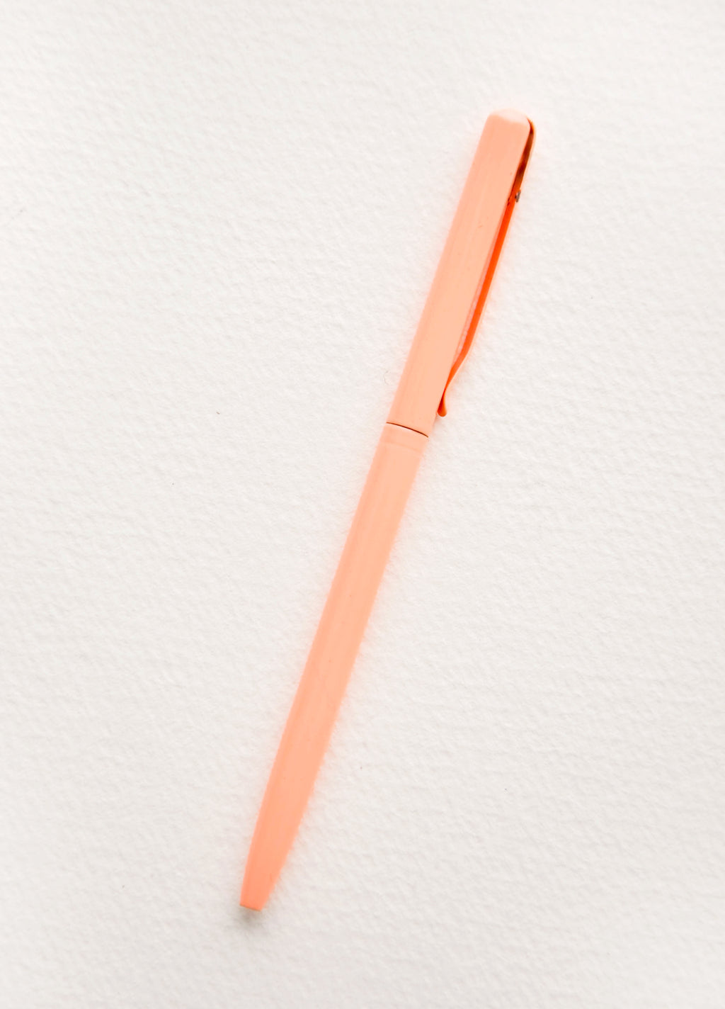 2: Slim pen in peach color. 