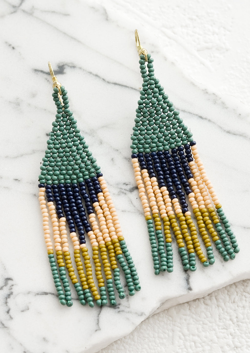 Spruce / Blush / Navy Multi: A pair of colorblocked beaded earrings with geometric design.