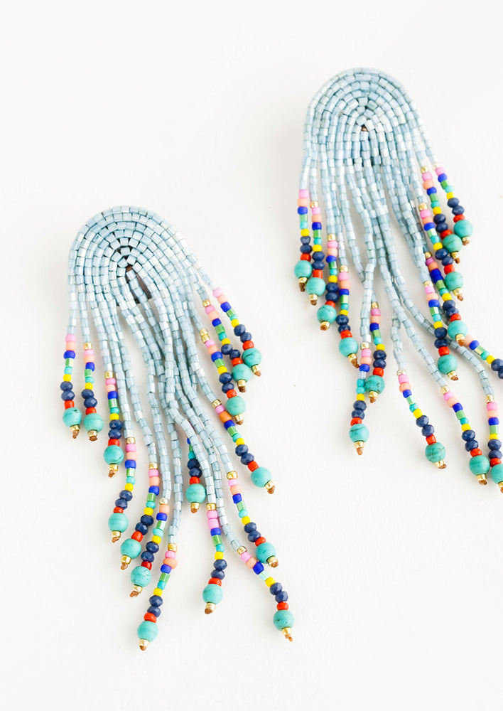 Aqua Multi: Dangly earrings with multiple strands stemming from an arched shape, heavily beaded in a multicolor mix of beads