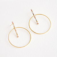 1: Round gold circle earrings with post across center of circle, featuring colored crystals