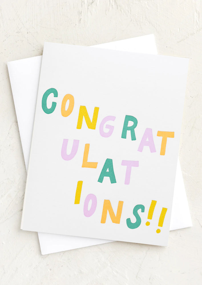 A card with colorful lettering reading "congratulations!".