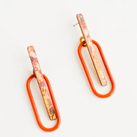1: Pair of earrings with patina'd brass bar and glossy red enamel oval