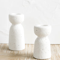 Short / White: Two short and tall white concrete candleholders with pumice-like texture.