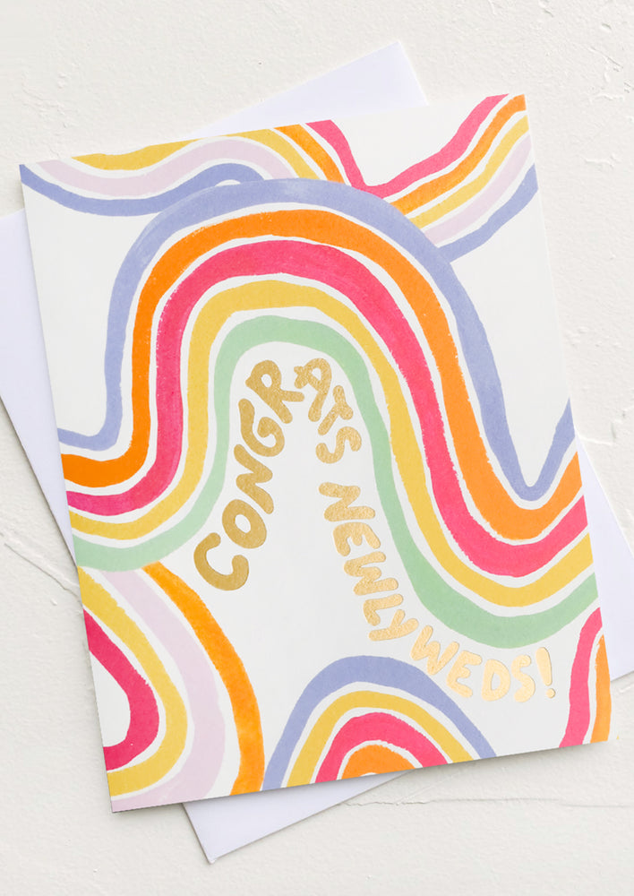 1: A greeting card with rainbow wave and text reading "Congrats newlyweds!"
