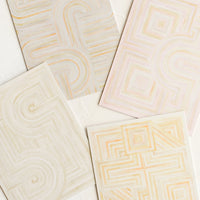 2: Four notecards with pastel geometric artwork design.