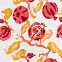 2: A block printed pomegranate pattern in red, pink and yellow.