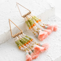 2: A pair of beaded earrings with tassel detail and triangle base.