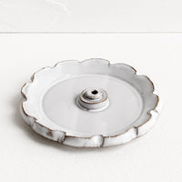 Natural White: A flower shaped ceramic incense holder in white glaze.