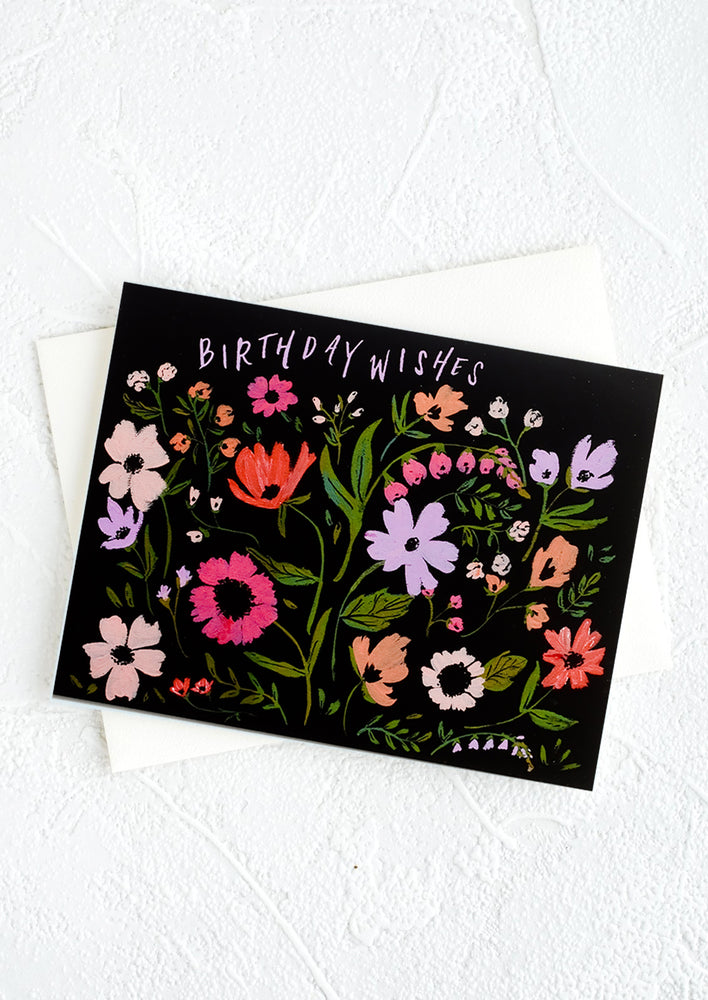 1: A birthday card with colorful florals reading "Birthday Wishes".