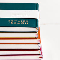 8: Stack of notebooks with colorful ribbon pagemarkers 