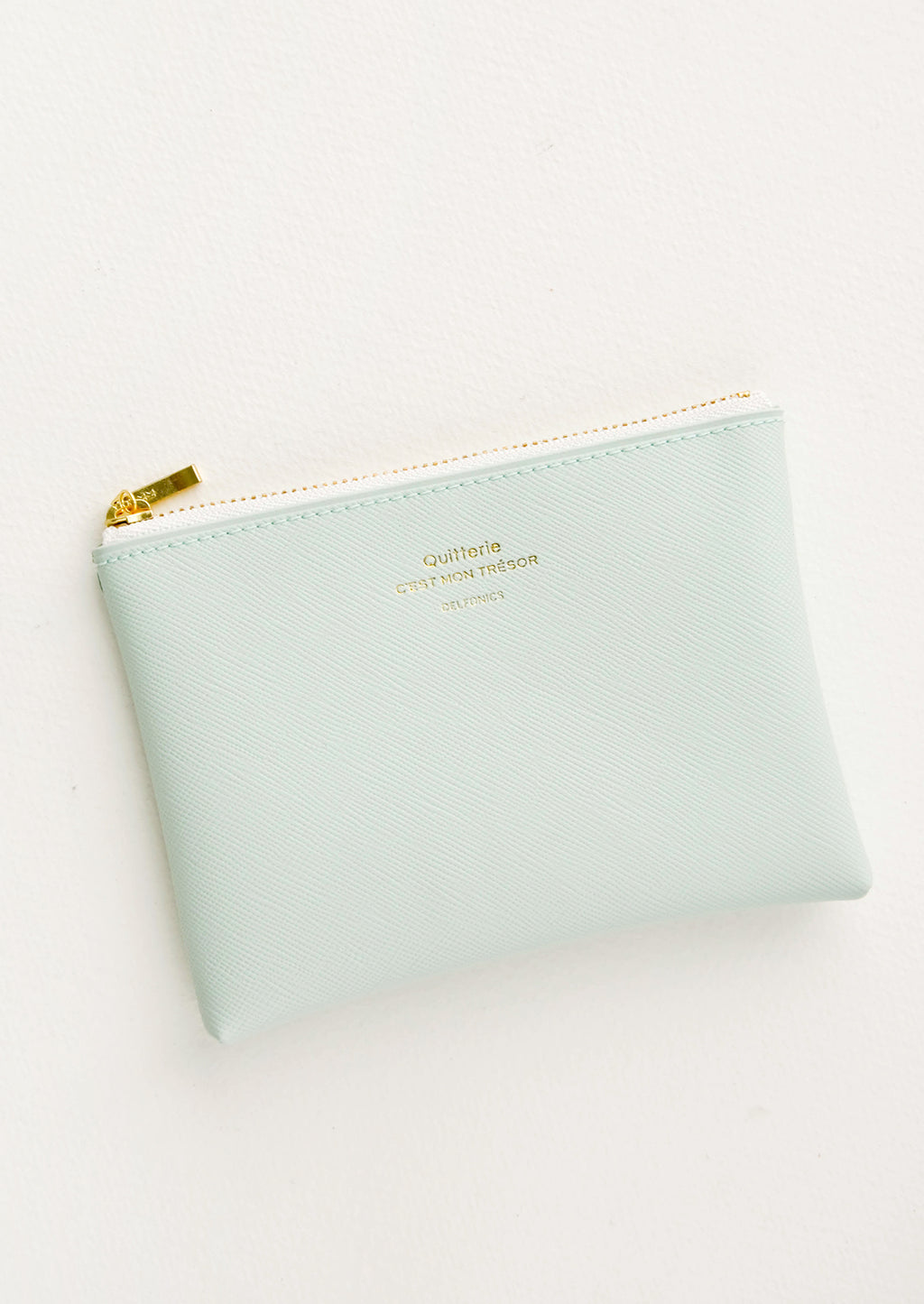 Mint / Small: Small vinyl coin pouch with gold zipper and crosshatch texture, in mint green.