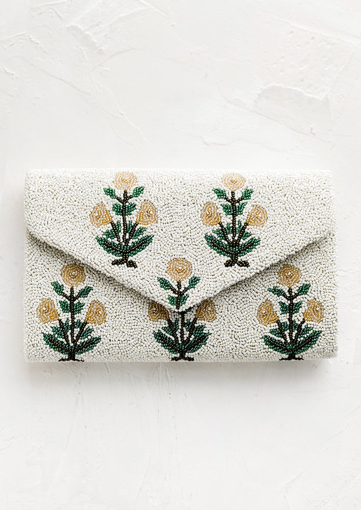 1: A beaded clutch in floral pattern and envelope silhouette.