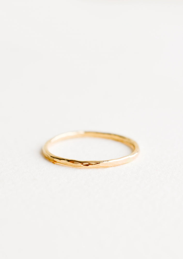 Thin hammered gold ring. 