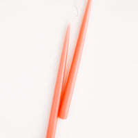 Coral: Pair of Two taper Candles in coral peach.