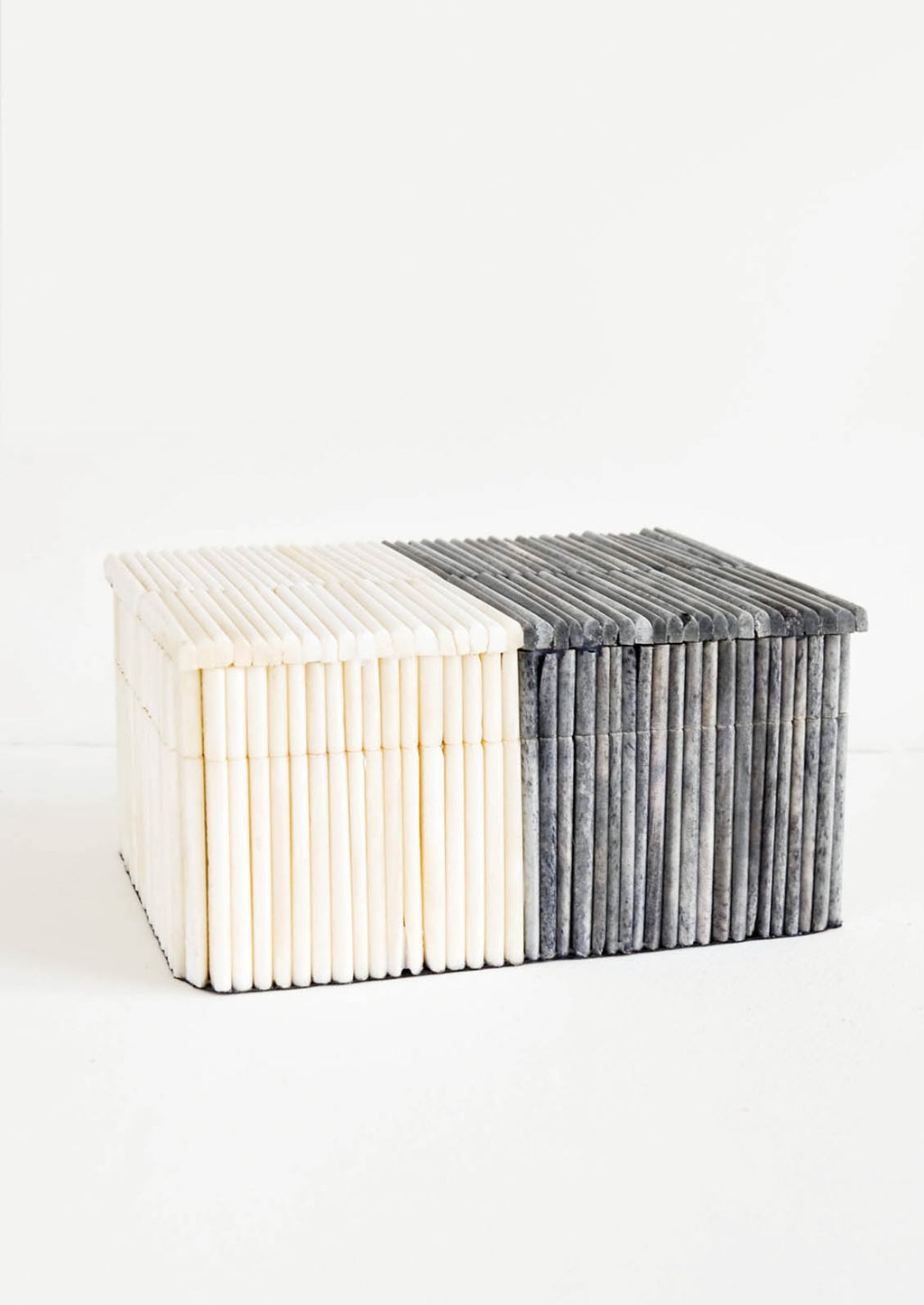1: Decorative storage box in rectangular shape, made from bone in ribbed, two-tone design in grey and white