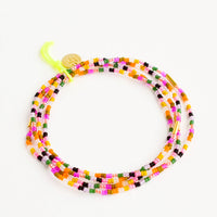 Mardi Gras Multi: Set of four colorful glass seed bead bracelets with brass accent bead