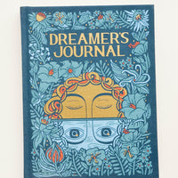 1: Fabric-covered journal with mystical moon and floral print, titled "Dreamer's Journal"