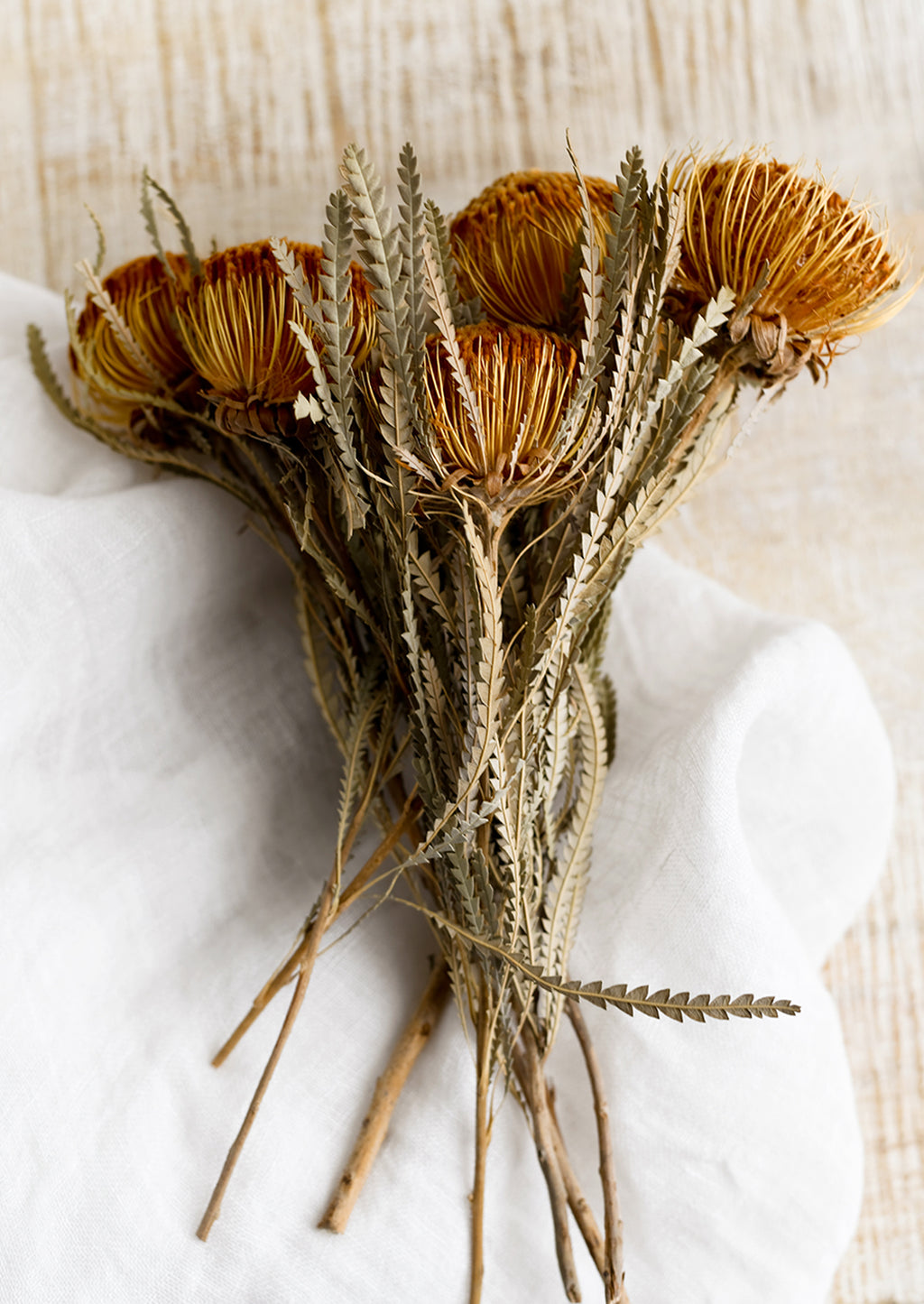 2: A bunch of dried mini protea stems.