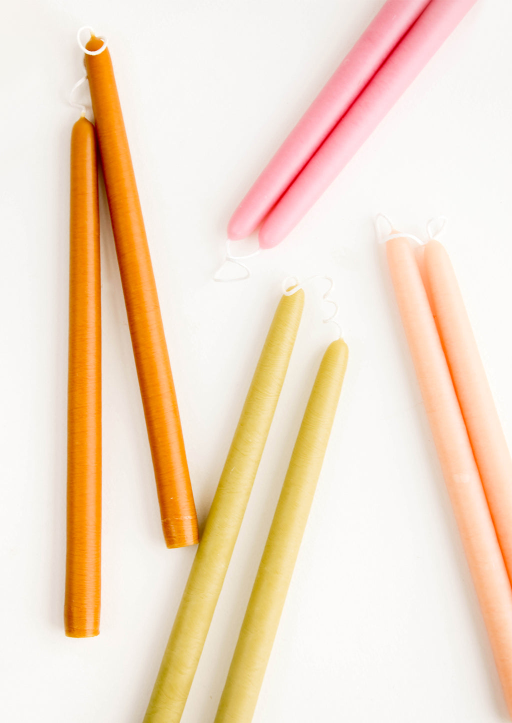 3: An arrangement of colorful taper candles