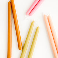 3: An arrangement of colorful taper candles