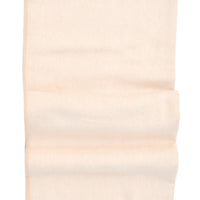 Almond: Tan colored throw blanket in fine herringbone weave and ivory tassel trim
