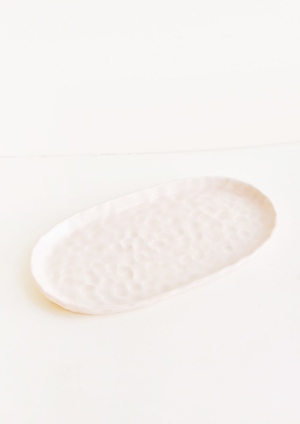Summer Sweet: Dapple Textured Oval Shaped Ceramic Trays in Pale Pink  - LEIF
