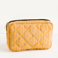 Small / Dainty Peach Floral: Flat and rectangular makeup travel bag with zip closure in yellow and peach floral