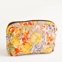 Small / Floral Multi: Flat and rectangular makeup travel bag with zip closure in colorful floral print