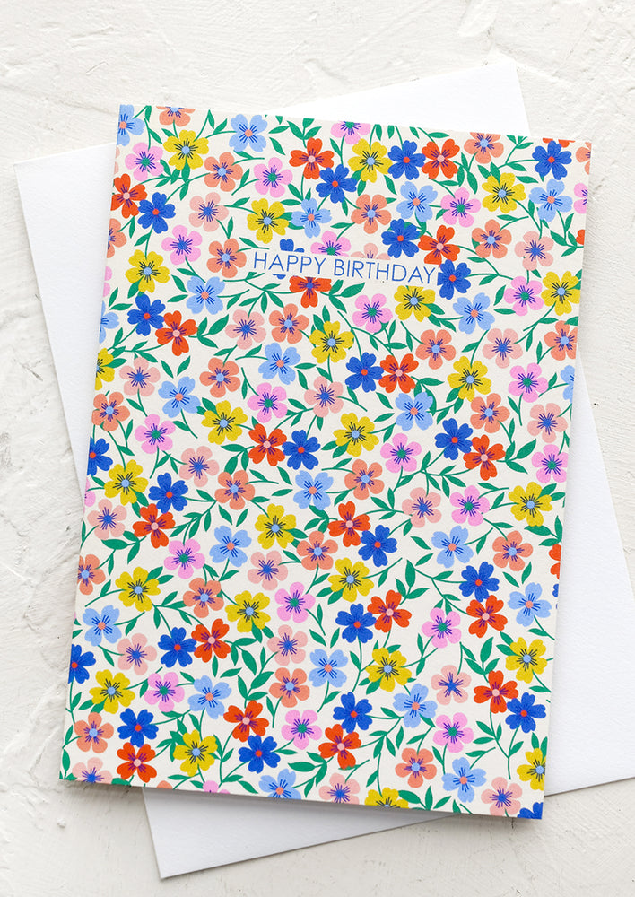 1: A card with overall digital floral pattern, text reads "happy birthday".