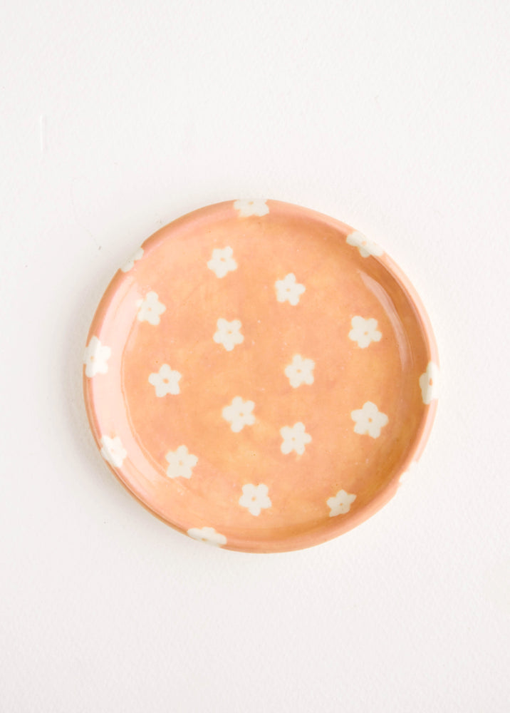 Peach Floral: Small, round ceramic dish in peach with small white flowers