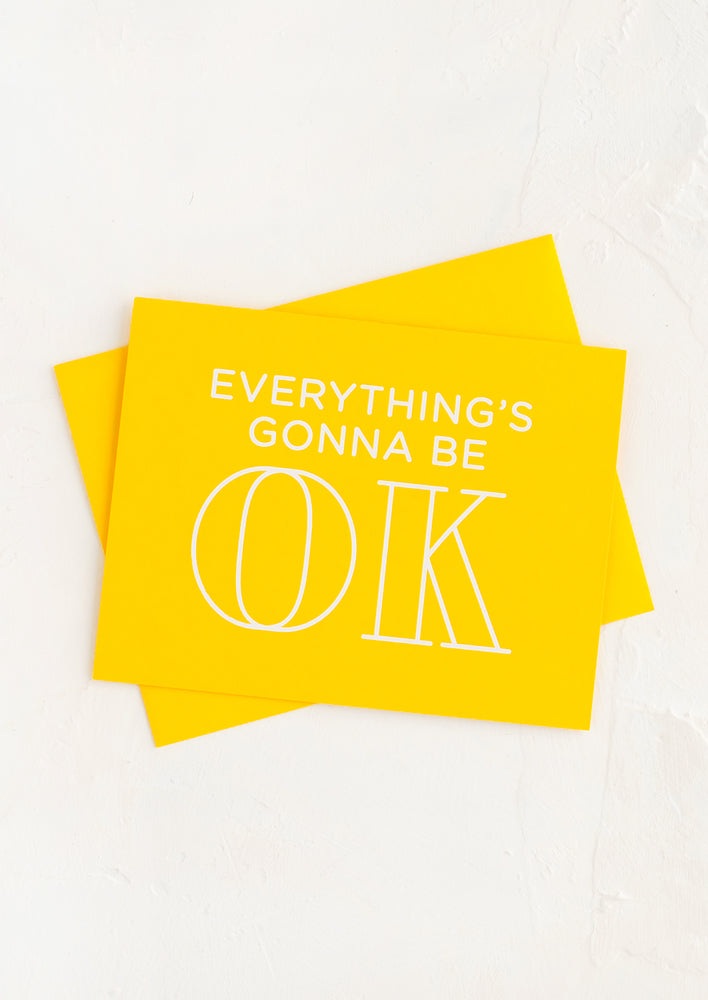 1: Yellow card with write text reading "Everything's gonna be OK".